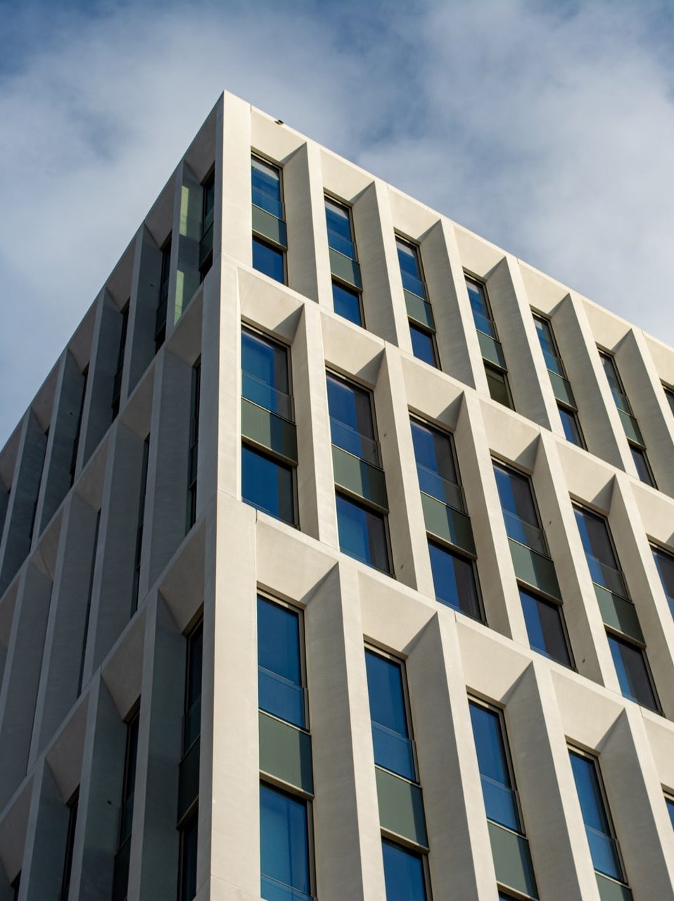 white concrete building under blue sky during daytime