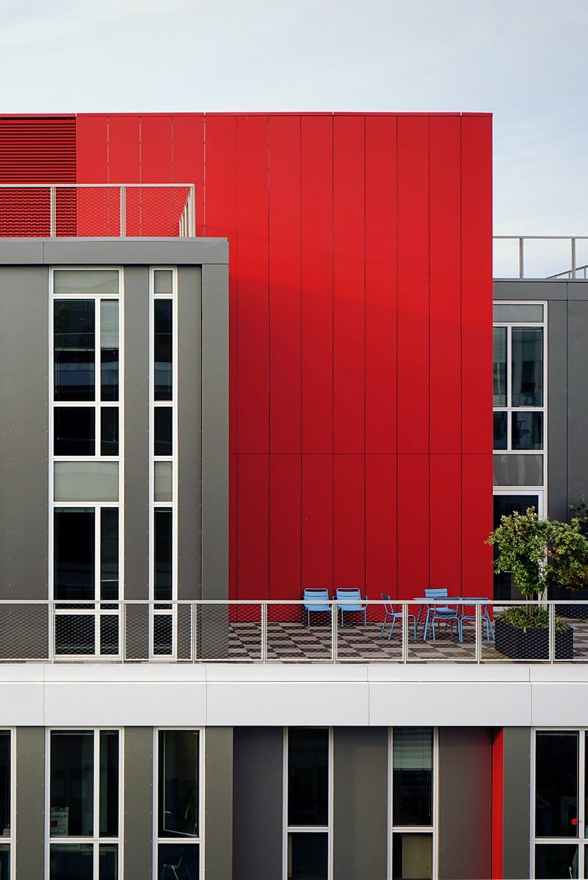 aerial photography of red and gray building